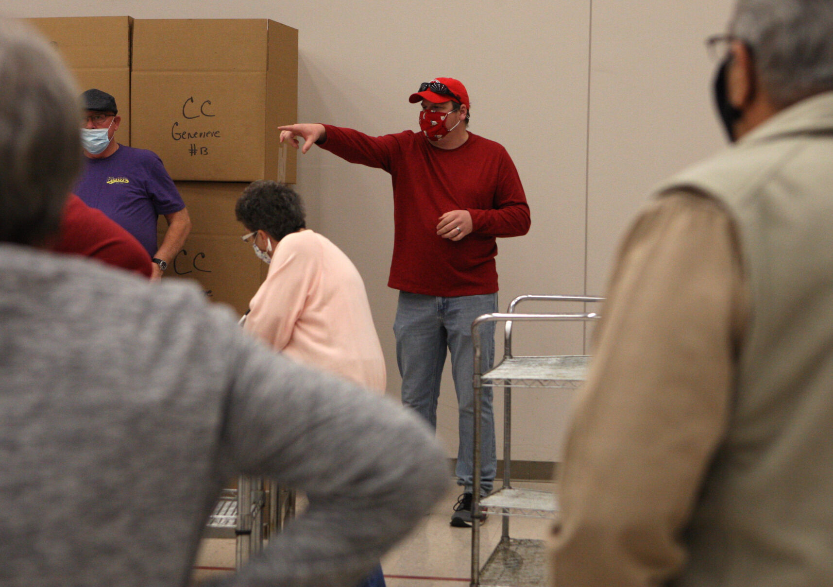 Eric Rehagen gives volunteers directions